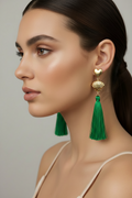 Gold seashell statement earrings with long green tassels